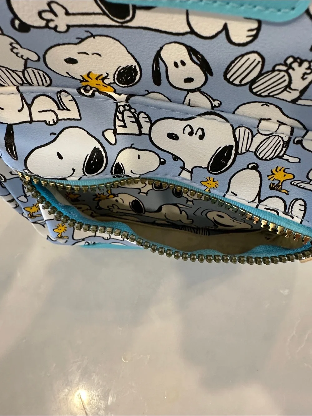 Peanuts Snoopy Mini Backpack in Light Blue with Woodstock Print